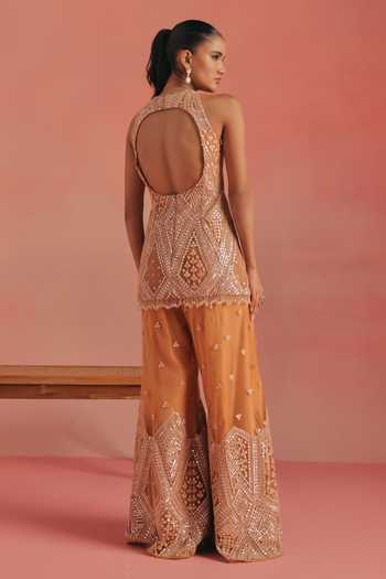 Shop_Twenty Nine_Orange Net Plunge Neck Embroidered Backless Peplum Tunic _at_Aza_Fashions