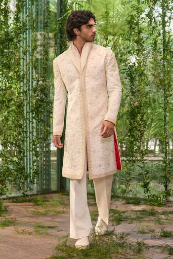 Buy_Jigar & Nikita_Ivory Silk, Satin Anant The Rising Royal Sherwani Set _at_Aza_Fashions