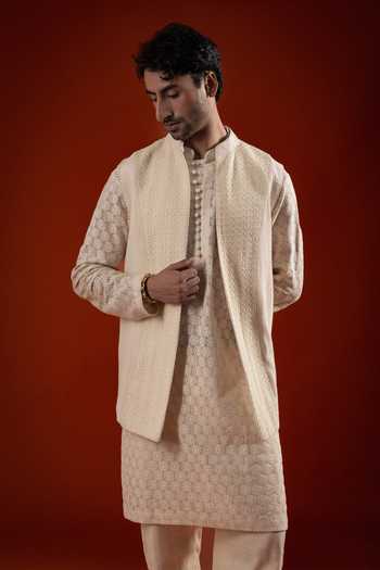Buy_Sanchit Sharma_Ivory Silk, Cotton Textured Kurta Set With Bundi _at_Aza_Fashions