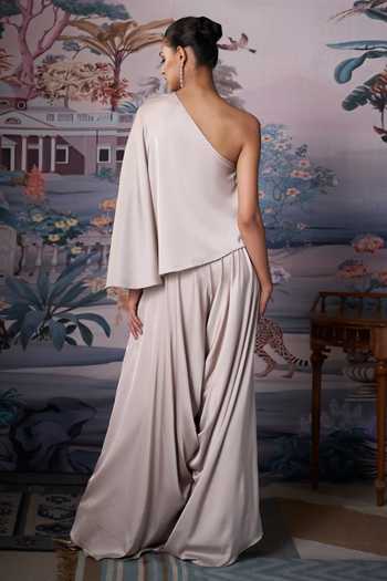 Shop_Amrta By Guneet Kondal_Ivory Satin One Shoulder Embroidered Draped Top And Pant Set _at_Aza_Fashions