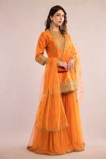 Saina Kapoor_Orange Dupion, Net Keyhole Neck, Yes Yoke Embroidered Kurta Gharara Set _Online_at_Aza_Fashions