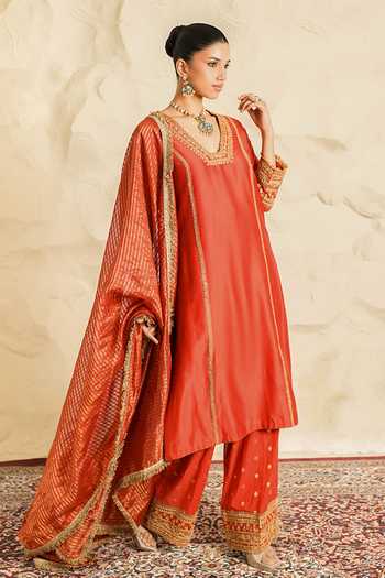 Nidhika Shekhar_Orange Chanderi V-neck Rangrez Placement Embroidered Kurta Set _at_Aza_Fashions