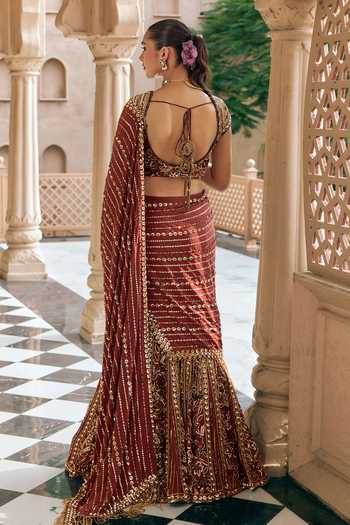 Shop_Nidhika Shekhar_Maroon Crepe, Shantoon Kanak Padma Embroidered Lehenga Saree With Blouse _at_Aza_Fashions