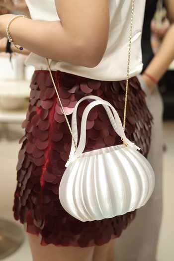 Buy_Orriri_White Drop Sculptural Ribbed Shell Bag _Online_at_Aza_Fashions