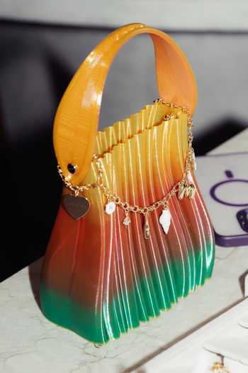 Buy_Orriri_Multi Color Prism Wave Textured Flexible Bag _at_Aza_Fashions