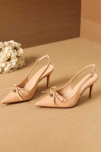 Shop_Ozzaro_Beige Glossed Edge Bow Accent Heels _at_Aza_Fashions