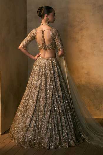 Angad Singh_Gold Net Sweetheart Neck Solstice Embroidered Bridal Lehenga Set _Online_at_Aza_Fashions