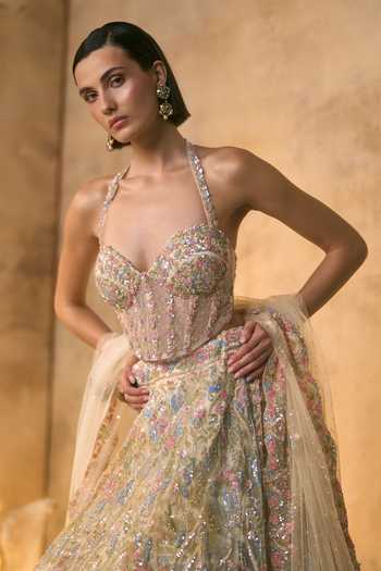 Angad Singh_Ivory Net Sequins, Beads, Celestia Botanical Embroidered Corset Lehenga Set _at_Aza_Fashions