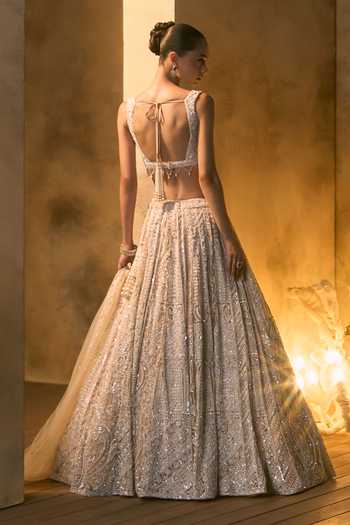 Angad Singh_Gold Net V-neck Vermeil Tonal Crystal Embroidered Lehenga Set _Online_at_Aza_Fashions