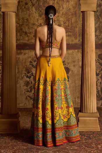 Shop_Kalista_Yellow Silk, Viscose Halter Neck Arika Floral Embroidered Blouse And Sharara Set _at_Aza_Fashions