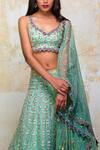 Shop_Izzumi Mehta_Green Lehenga And Blouse Organza Dupatta Net Leaf Neck Embellished Bridal Set _at_Aza_Fashions