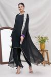 Buy_Ekta Singh_Black Georgette Round Dhoti Pant Set With Asymmetric Floral Hem Cape _at_Aza_Fashions