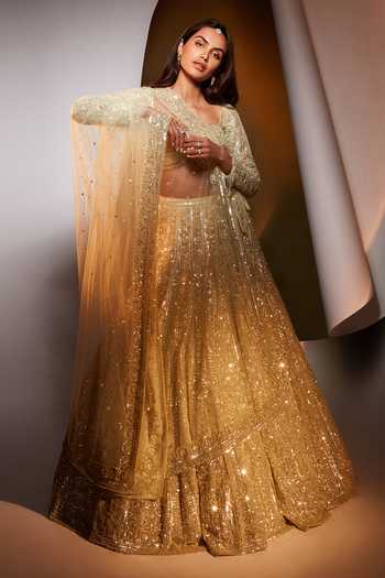 Buy_Seema Gujral_Gold Net Sequin And Beads Sweetheart Neck Embroidered Bridal Lehenga Set_at_Aza_Fashions