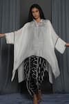 Shop_Krishna Mehta_White Chanderi Hand Embroidered Sequin Shirt Collar Asymmetrical Hem Cape Tunic _at_Aza_Fashions