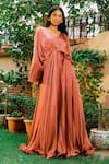 Shop_OMANA BY RANJANA BOTHRA_Peach Satin Sequin V Neck Rust Flared Gown _at_Aza_Fashions