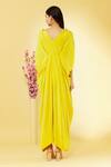 Shop Megha Garg Yellow Pure Crepe V Neck Cowl Draped Jumpsuit at Aza Fashions Shop_Megha Garg_Yellow Pure Crepe V Neck Cowl Draped Jumpsuit _at_Aza_Fashions