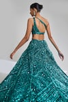 Shop_Seema Gujral_Green Net Embroidered Sequins One Shoulder Bridal Lehenga Set  _at_Aza_Fashions