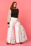 Shop_Label Shristi Chetani_White Cotton Print Abstract Flared Pant _at_Aza_Fashions