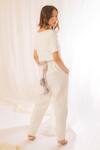 Shop_Vaani Beswal_Off White Plain Straight Fit Trouser With Embroidered Belt _at_Aza_Fashions