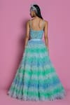 Shop_Mala and Kinnary_Blue Net Embellishment Sequin Sweetheart Neck Ombre Tiered Lehenga And Corset Set _at_Aza_Fashions