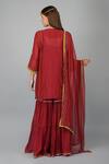 Shop_Devyani Mehrotra_Red Chanderi 40grm Embroidered Sequins U Neck Flower Garnet Kurta Gharara Set_at_Aza_Fashions