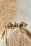 Shop_Amyra_Cream Embroidery, Tassels Mirai Potli_at_Aza_Fashions