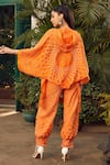 Shop_Twenty Nine_Orange Crushed Raidaana Silk Tie And Dye Bandhani Pattern V Neck Hoodie _at_Aza_Fashions
