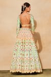 Shop_Diyarajvvir_Green Silk, Cotton Cut Work, Mirrors, Sequins, Embroidery Cutdana Lehenga Set _at_Aza_Fashions