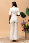 Shop_Rishi and Vibhuti_Ivory Jute Fringe Lapel Collar Senorita Embellished Jacket And Pant Set _at_Aza_Fashions