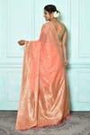 Shop_Nazaakat by Samara Singh_Peach Banarasi Silk Woven Floral Vine Bordered Saree_at_Aza_Fashions