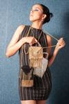 Shop_Forever Noor_Gold Embellished O Metallic Chain Tassel Handcrafted Bag _at_Aza_Fashions