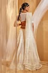 Shop_House of Exotique_Ivory Net Embroidery Round Neck Geometric Embellished Lehenga Set _at_Aza_Fashions