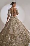 Seema Gujral_Green Net Embroidered Sequin Sweetheart Metallic Bridal Lehenga Set  _Online_at_Aza_Fashions