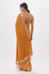 Shop_Nakul Sen_Orange Chiffon Embroidered Cutdana Plunge Neck Saree With Blouse _at_Aza_Fashions