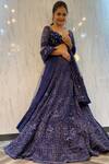 Shop_Pallavi Poddar_Blue Net Beads, Sequins Sweetheart Neck Midnight Embroidered Lehenga Set _at_Aza_Fashions