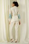 Shop Sakshi Khetterpal Ivory Chanderi Pearls, Beads, Embroidery Collared Sleeve Shirt And Pant Set at Aza Fashions Shop_Sakshi Khetterpal_Ivory Chanderi Pearls, Beads, Embroidery Collared Sleeve Shirt And Pant Set _at_Aza_Fashions