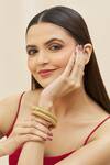 Shop_The Bling Girll_Gold Plated Carved Bangle - Set Of 2_at_Aza_Fashions