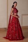 Shop_Nadine Dhody_Red Tulle Embroidery Sequin Round Laura Draped Blouse And Lehenga Set  _at_Aza_Fashions