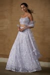 Shop_Nadine Dhody_Purple Tulle Embroidery Sequin Isabella Cutdana Bridal Lehenga Set _at_Aza_Fashions