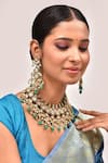 Shop_Zevar By Geeta_Gold Plated Stones, Pearls Mughal Pattern Kundan Embellished Necklace Set _at_Aza_Fashions