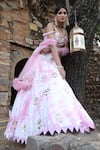 Shop_Nitisha Kashyap Official_Off White Net, Silk Beads, Sequins, Mirror Embroidered Uppada Lehenga Set _at_Aza_Fashions