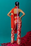 Shop_Latha Puttanna_Orange Silk Embroidered Tiger Batik Pattern Pant _at_Aza_Fashions