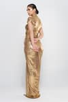 Shop_Cham Cham_Gold Stretch Knit Foil Plain V Neck Pleated Draped Sleeve Gown For Women_at_Aza_Fashions