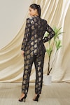 Shop_Peenacolada_Black Silk Brocade Floral Pattern Notched Lapel Blazer And Trouser Set_at_Aza_Fashions