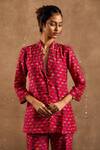 Shop Label Kinjal Modi Pink Cotton Silk Lotus, Metal Coin Shawl Collar Printed Blazer And Pant Set at Aza Fashions Shop_Label Kinjal Modi_Pink Cotton Silk Lotus, Metal Coin Shawl Collar Printed Blazer And Pant Set _at_Aza_Fashions