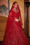 Shop_Nadine Dhody_Red Tulle Crystals, Sequins, Amour Floral Hand Embroidered Bridal Lehenga Set _at_Aza_Fashions