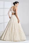 Shop_Seema Gujral_Ivory Net Embroidery Pearl One Shoulder Blouse And Lehenga Set  _at_Aza_Fashions