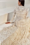 Shop Ritika Mirchandani Ivory Net Embroidery Bead Jacket Open Resham Sharara Set at Aza Fashions Shop_Ritika Mirchandani_Ivory Net Embroidery Bead Jacket Open Resham Sharara Set _at_Aza_Fashions