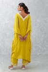 Shop_Devnaagri_Yellow Muslin Embroidered Dori And Thread Work V Neck Flower Kaftan & Pant Set _at_Aza_Fashions