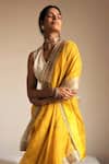 Shop_Shorshe Clothing_Yellow Handloom Tissue Hand Embroidered And Embellished Pearl Saree For Women_at_Aza_Fashions